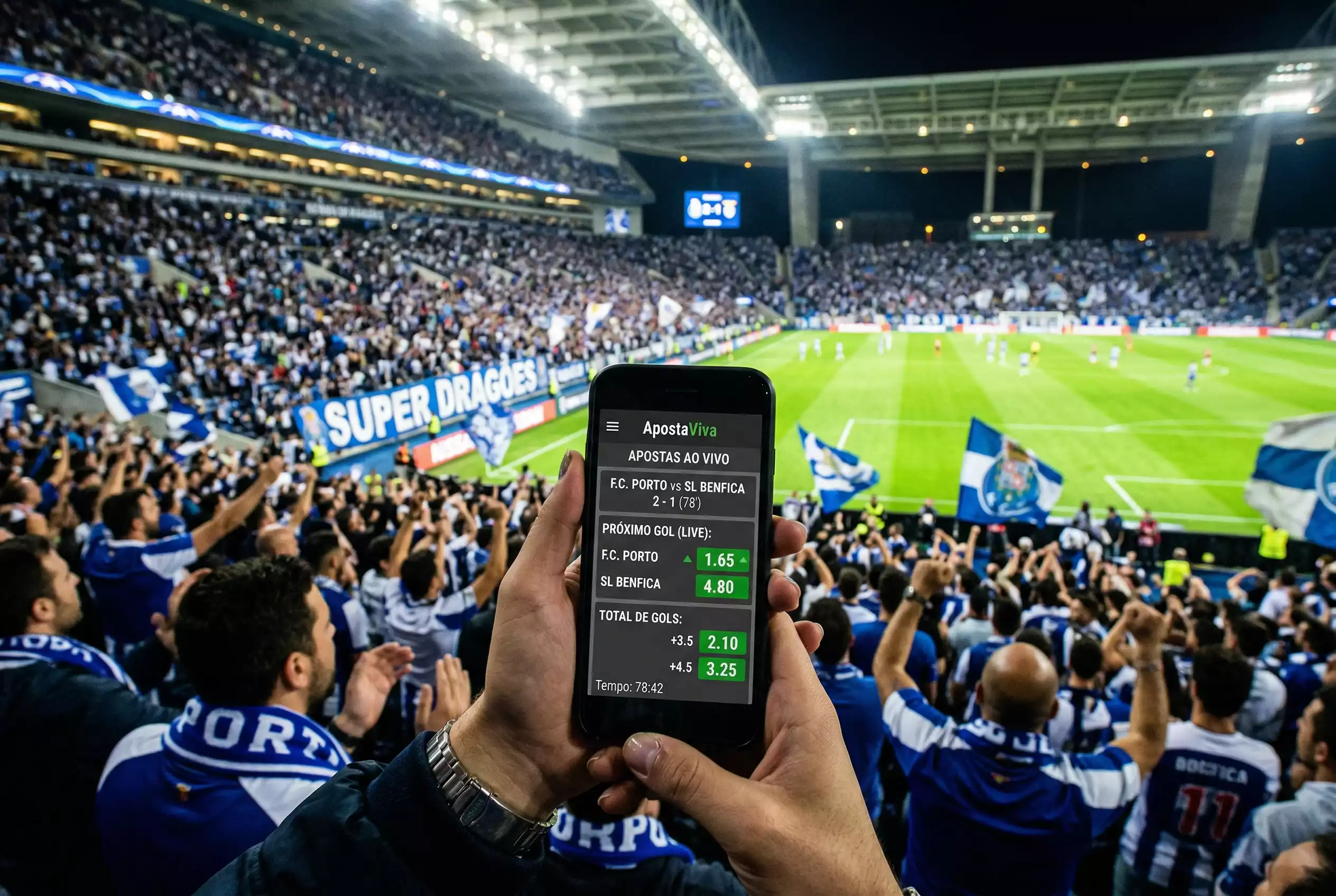 Estadio de futebol ao vivo com ecra mostrando odds em tempo real